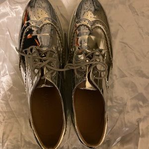 Liliana Wingtip Silver Sneakers.  Size 8 1/2.